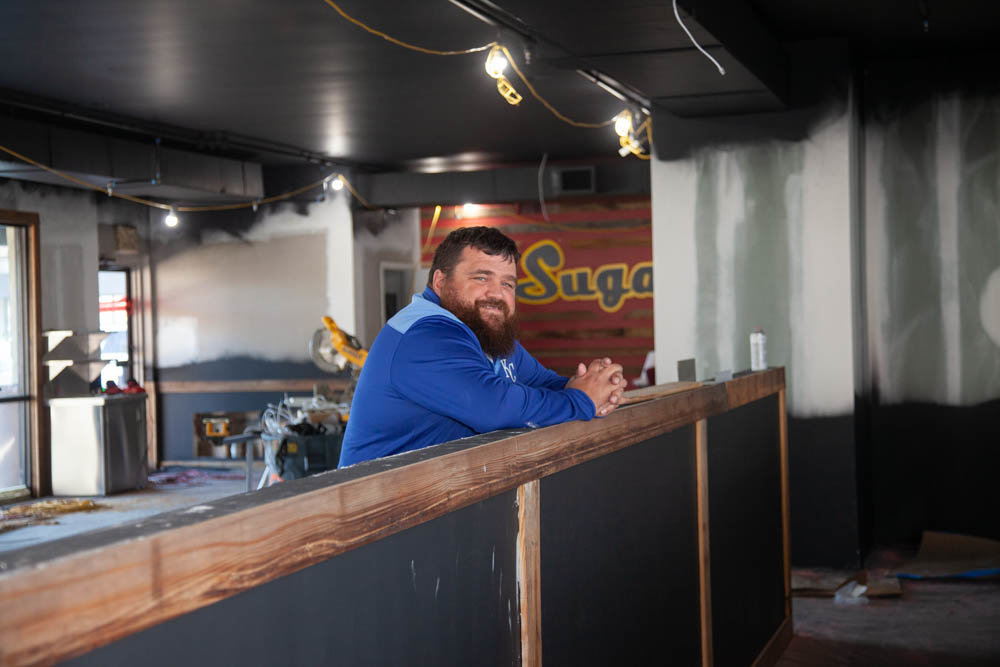Kevin Russell heads up the staff of Sugarfire Smokehouse, which opened Sunday at 1730 E. Republic Road, Ste. A. He's pictured above in October.